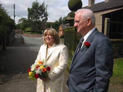 Missy & Tom outside the church.