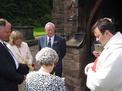Outside the church at last.