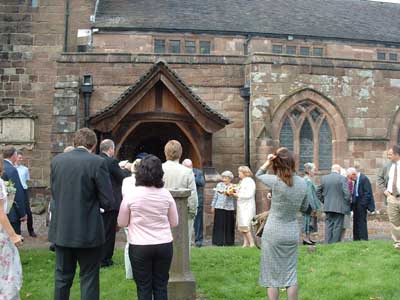 Outside the church as Missy & Mike have just exited.