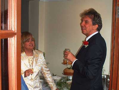 Missy & Mike toasting.