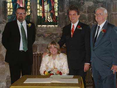 Signing the Register.